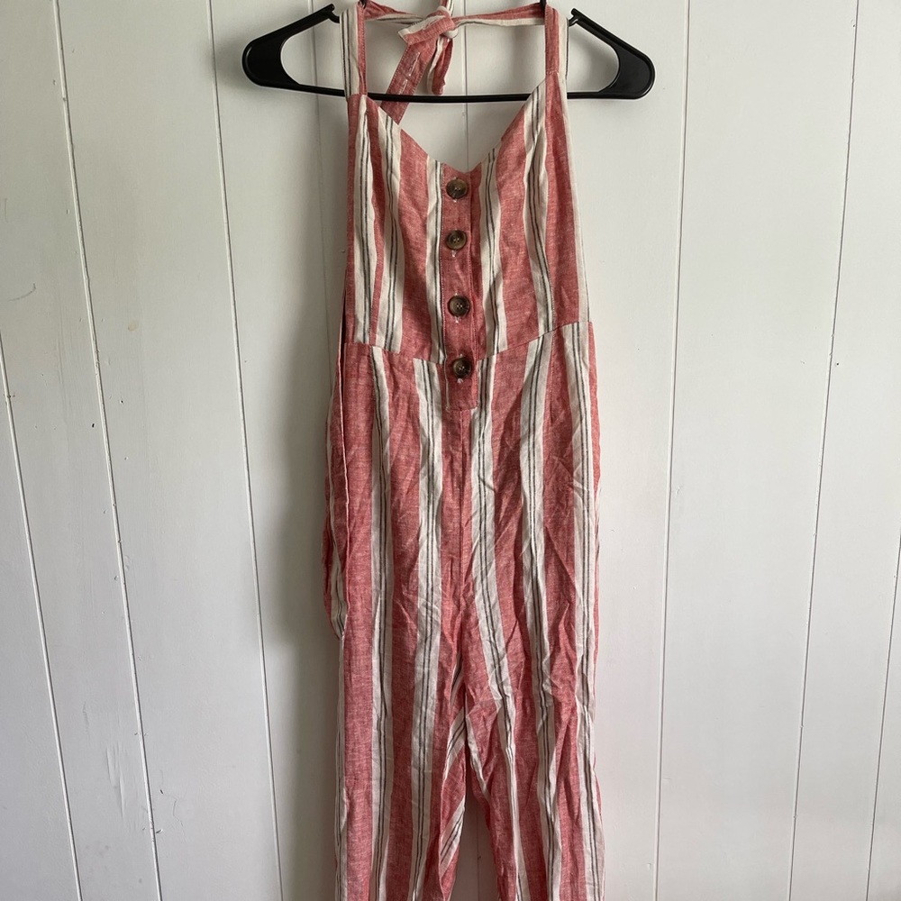 Jumper. NWT. Never worn but does have some tears.